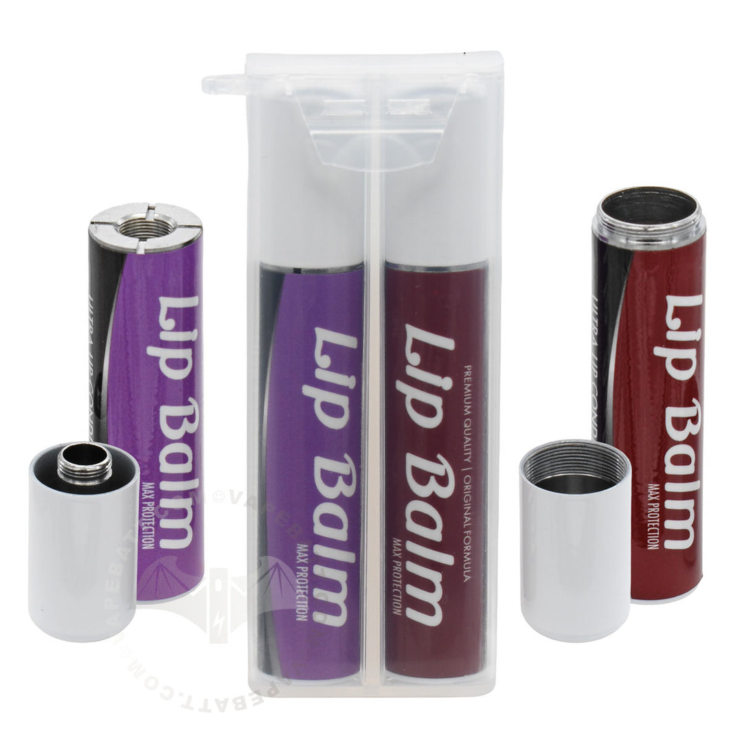 Two Penjamin lip balm tubes in a clear plastic case, shown with their silver caps removed and placed beside them on a white background. Penjamin cart battery is purple and the storage tube is dark red, both labeled 'Lip Balm' with 'Max Protection' underneath.