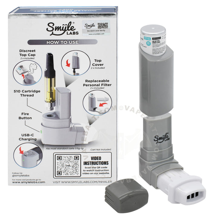 A Smile Labs inhaler device in gray and white, shown next to its retail packaging box on a white background. The box includes instructional diagrams and branding.