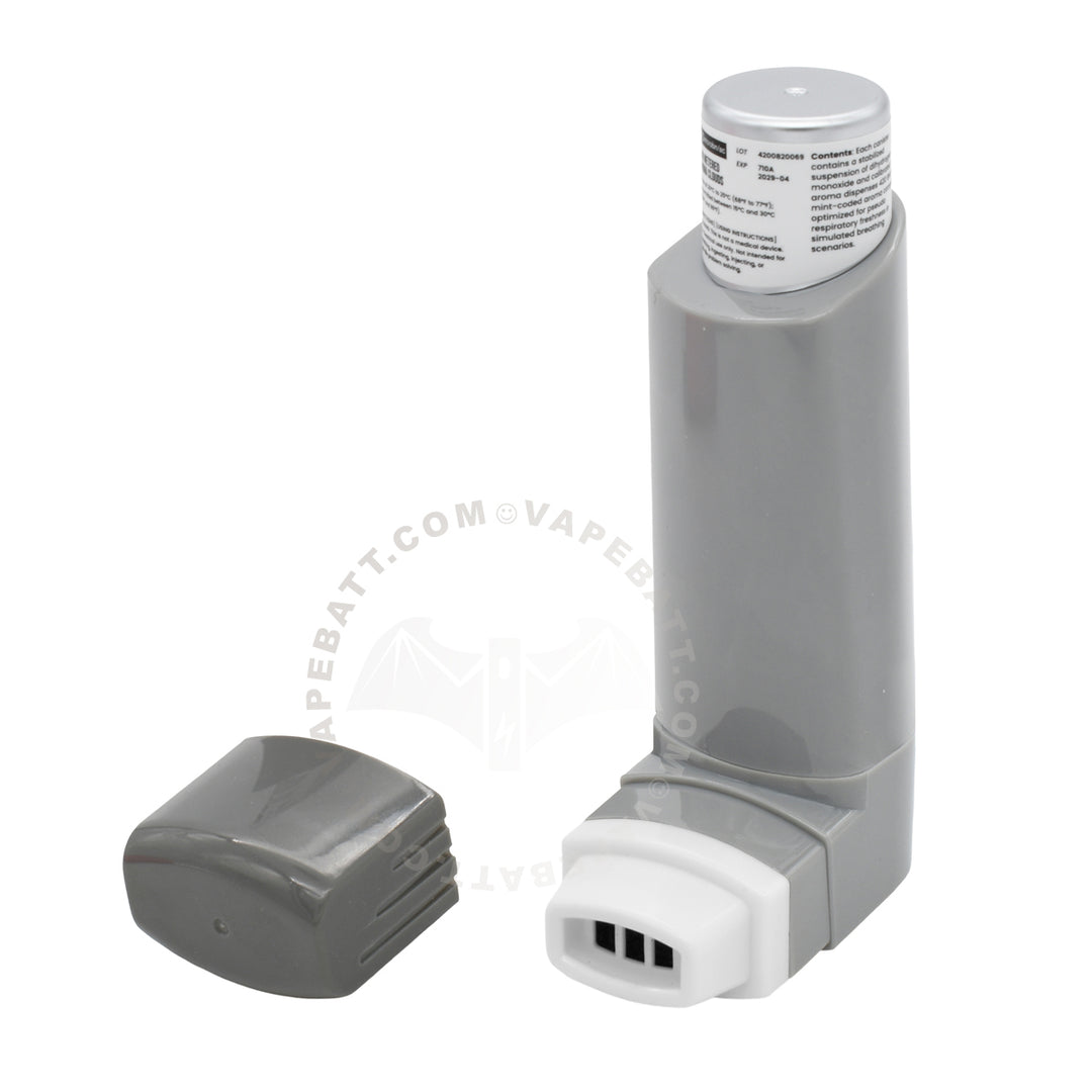 A gray and white medical-style inhaler 510 battery device with a detached dark gray cap placed beside it on a white background.
